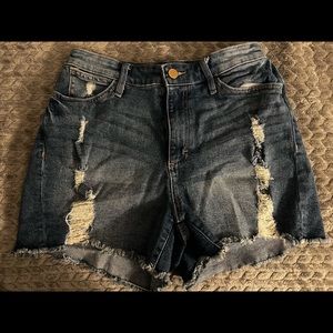 Jennifer Lopez, high waisted jean shorts.